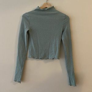 Lettuce hem mock neck sweater